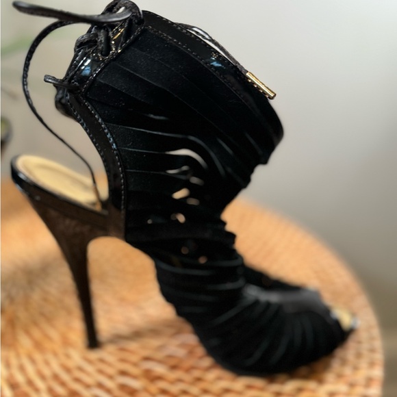 Size 7. Suede heel. Ties up the back. 3 1/2 inch heel - Picture 3 of 5